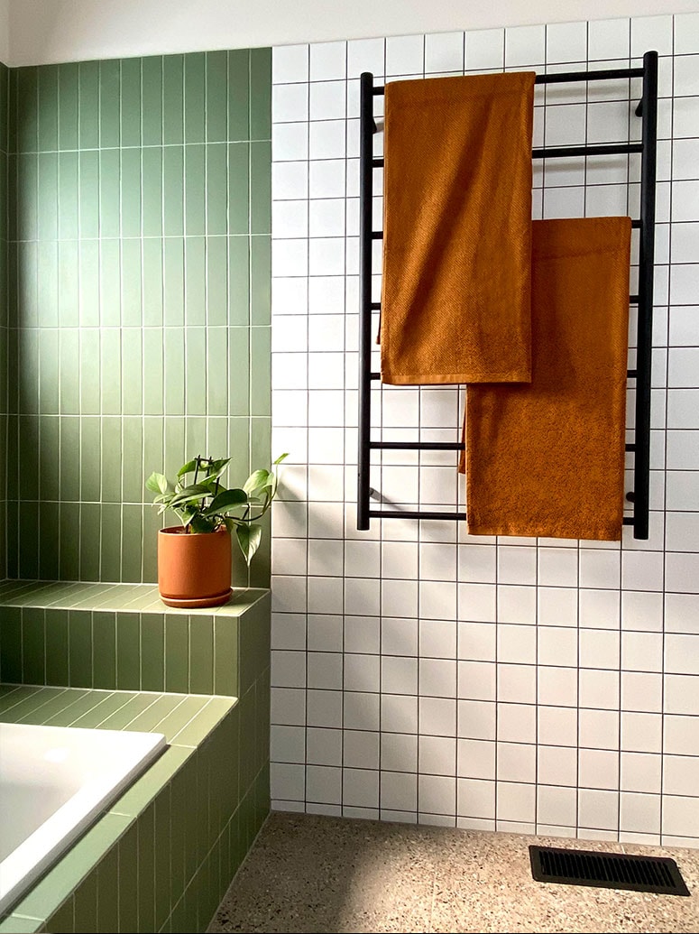 Luxury tiled shower renovation by Kat's Plumbing